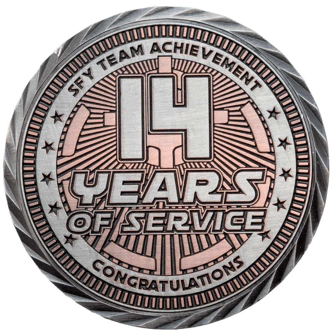 Antiqued silver and copper medallion with service-years text and a textured rope edge