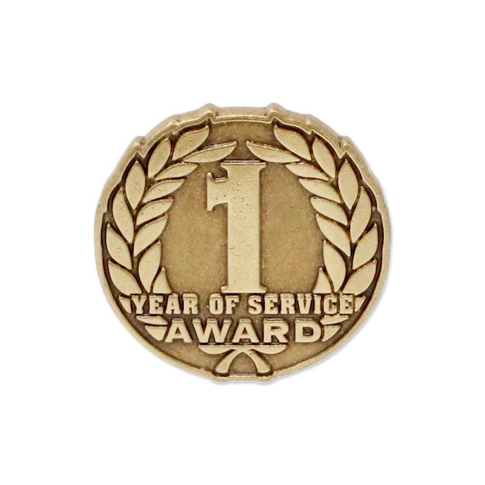 Custom die struck pin with raised and recessed metal detail