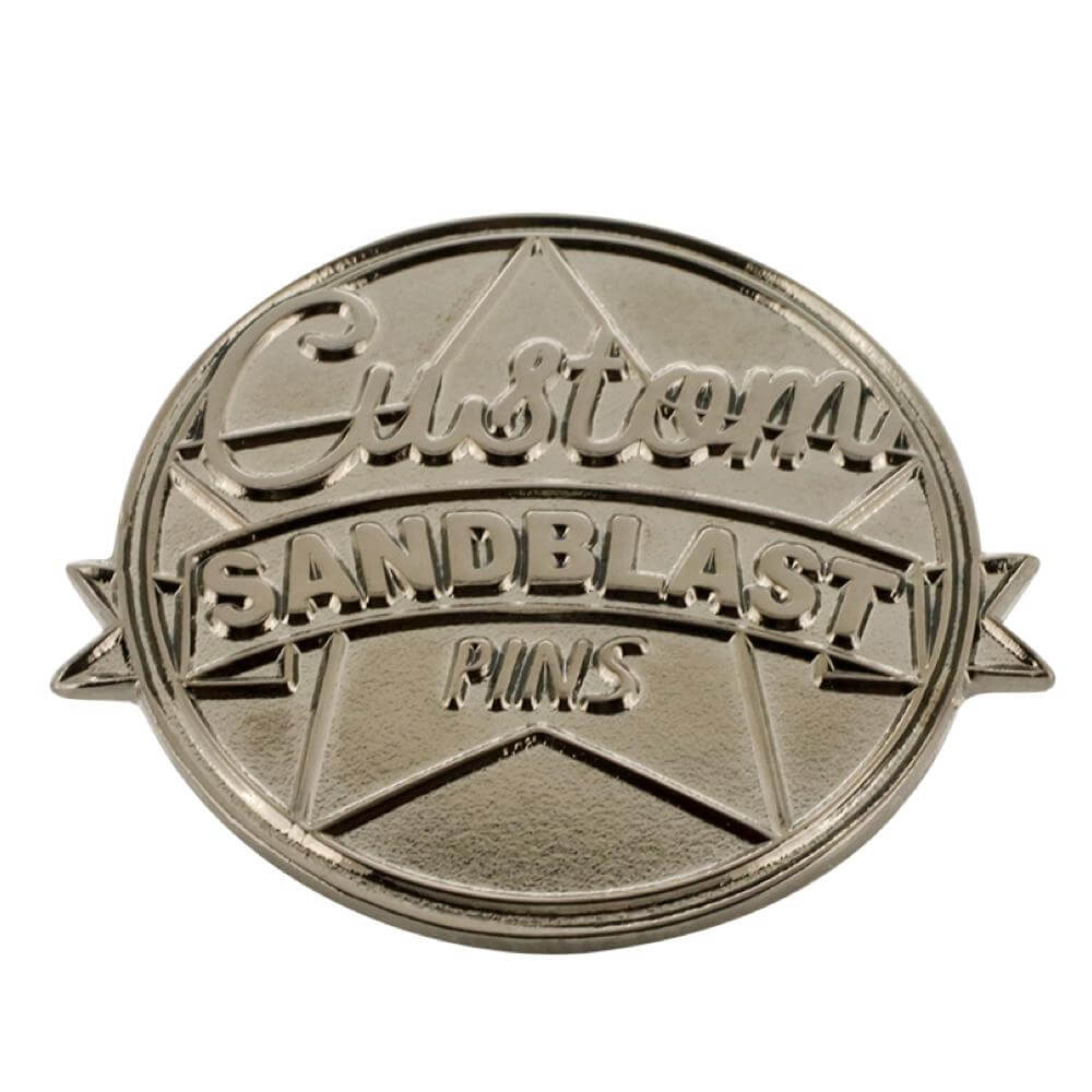 Embossed metal die struck pin design example