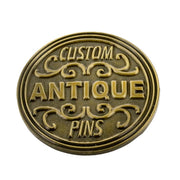 Raised lettering on a custom die struck pin