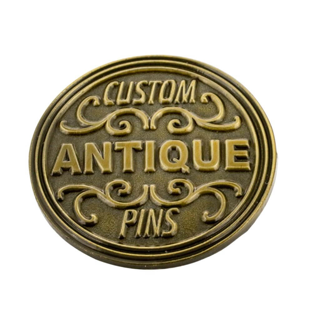 Raised lettering on a custom die struck pin