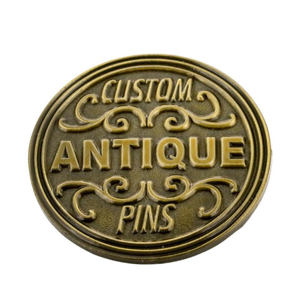 Raised lettering on a custom die struck pin
