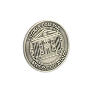 Die struck pin with recessed and raised artwork