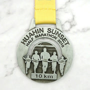 Custom race medal with ribbon and detailed artwork