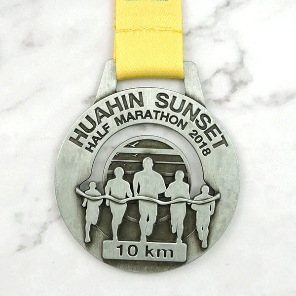Custom race medal with ribbon and detailed artwork