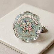 Custom acrylic pin with a detailed floral illustration
