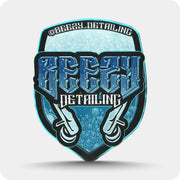 Custom embroidered shield patch with a detailed business logo in blue and teal thread
