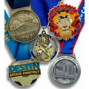 Custom die struck medals in antique gold and antique silver for school, arts and athletic awards