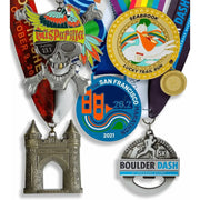 Custom running medals in die-cut shapes and antique silver, from 5K to marathon finisher awards