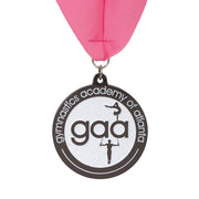 Custom gymnastics medal in black nickel with white glitter enamel and a pink neck ribbon