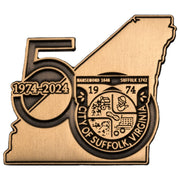 Custom die struck anniversary lapel pin with raised antique metal detail